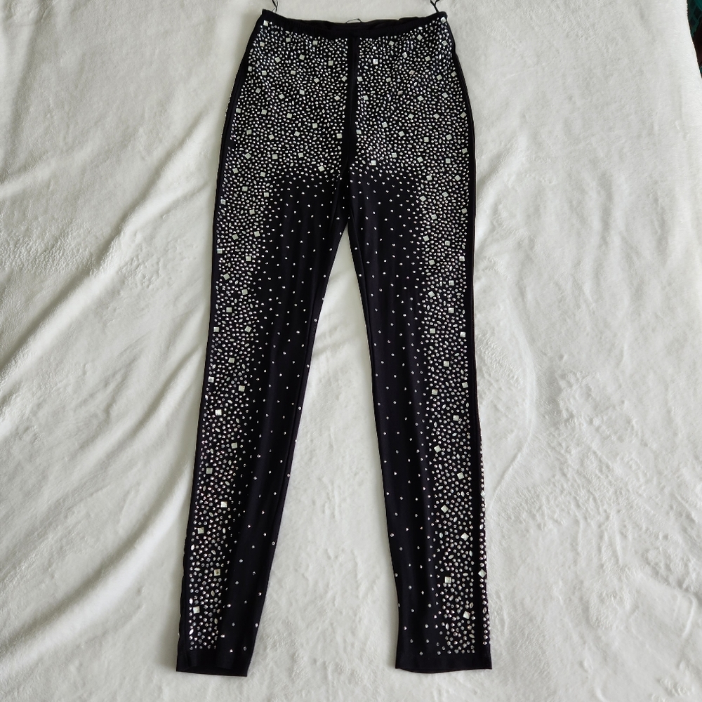 Pants with Princess rhinestone. Size M color black,worn only once.
